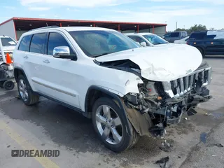 2013 Jeep Grand Cherokee Overland with VIN 1C4RJECT6DC533434, listed as a IAAI auction lot 41656116 with 122,809 mi miles. Bid and sale history available at carsss.com. Image 1.