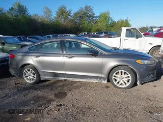 2014 Ford Fusion SE with VIN 1FA6P0HD3E5404598, listed as a IAAI auction lot 41854404 with 219,552 mi miles and . Bid and sale history available at DreamBid. Image 13.