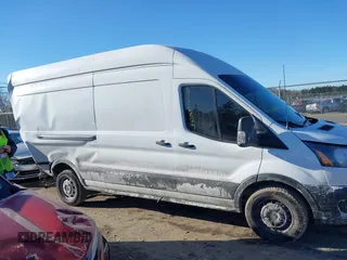2021 Ford Transit Cargo with VIN 1FTBW3X82MKA14027, listed as a IAAI auction lot 41423524 with 121,221 mi miles. Bid and sale history available at carsss.com. Image 13.