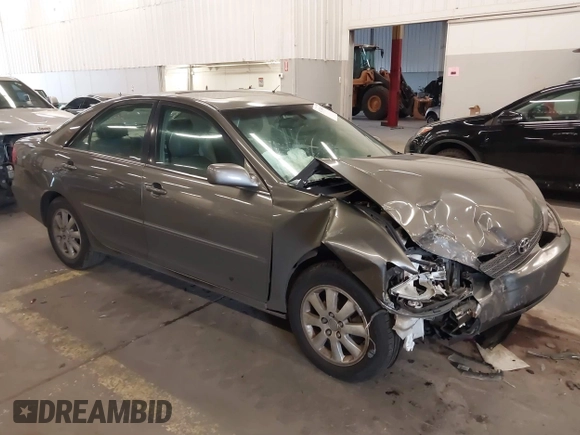 2003 Toyota Camry LE with VIN 4T1BE32K13U754348, listed as a IAAI auction lot 41765418 with 194,227 mi miles and . Bid and sale history available at DreamBid. Image 1.