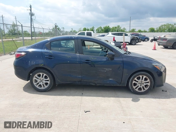 2018 Toyota Yaris with VIN 3MYDLBYV7JY305900, listed as a IAAI auction lot 42052167 with 128,876 mi miles and . Bid and sale history available at DreamBid. Image 13.