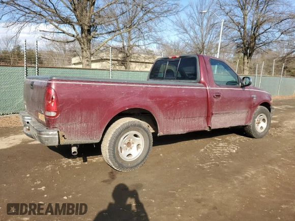 1999 Ford F-150 with VIN 1FTRF17W7XNA44872, listed as a Copart auction lot 41815695 with 182,678 mi miles and Salvage title. Bid and sale history available at DreamBid. Image 3.