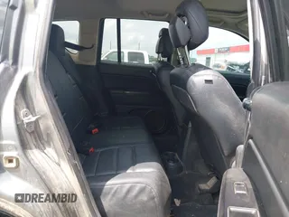 2011 Jeep Compass Latitude with VIN 1J4NT1FB4BD246549, listed as a IAAI auction lot 42156761 with 232,739 mi miles. Bid and sale history available at carsss.com. Image 8.