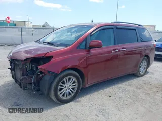 2016 Toyota Sienna XLE with VIN 5TDYK3DC7GS716470, listed as a IAAI auction lot 42177176 with 121,165 mi miles and . Bid and sale history available at DreamBid. Image 2.