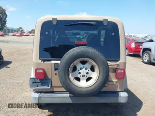 1999 Jeep Wrangler Sahara with VIN 1J4FY49S8XP462512, listed as a IAAI auction lot 42165052 with 146,135 mi miles and . Bid and sale history available at DreamBid. Image 17.