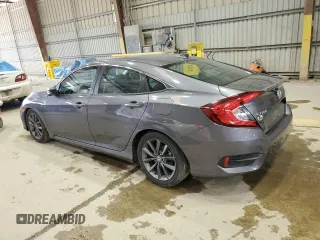 2021 Honda Civic Sedan EX with VIN 2HGFC1F38MH706774, listed as a Copart auction lot 54343375 with 65,469 mi miles and Salvage Title. Bid and sale history available at carsss.com. Image 2.