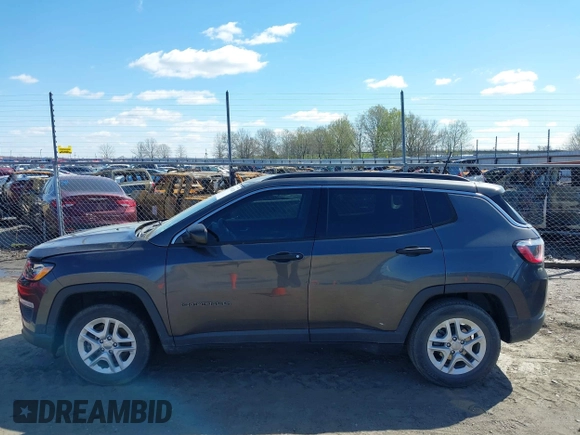 2019 Jeep Compass Sport with VIN 3C4NJCAB0KT613116, listed as a IAAI auction lot 39002435 with 59,805 mi miles and . Bid and sale history available at DreamBid. Image 14.