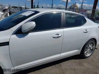 2011 Kia Optima LX with VIN KNAGM4A71B5072995, listed as a IAAI auction lot 41946138 with 196,551 mi miles. Bid and sale history available at carsss.com. Image 15.