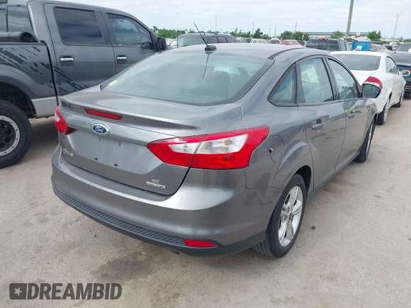 2014 Ford Focus SE with VIN 1FADP3F27EL139920, listed as a IAAI auction lot 42024617 with 143,223 mi miles and . Bid and sale history available at DreamBid. Image 4.