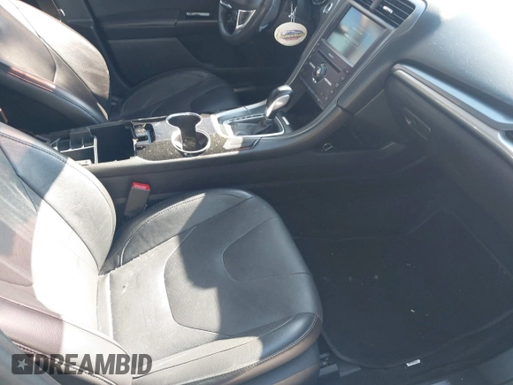 2016 Ford Fusion Titanium with VIN 3FA6P0K90GR179528, listed as a IAAI auction lot 41587248 with 230,264 mi miles and . Bid and sale history available at DreamBid. Image 5.