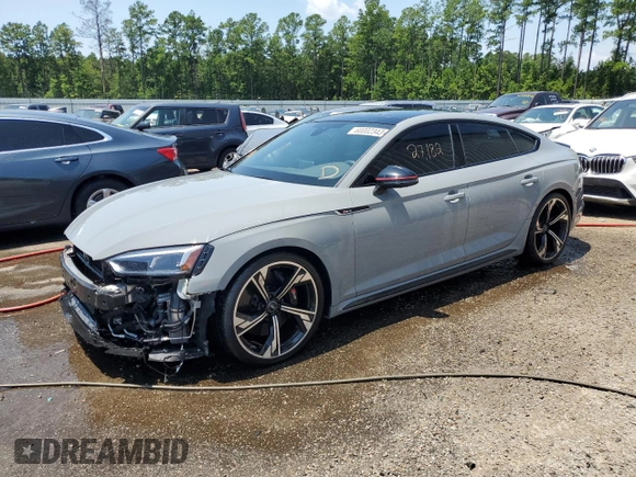 2019 Audi RS 5 Sportback z VIN WUABWCF5XKA907964, wystawiony jako Copart lot #60002343 z przebiegiem 27 182 mil mil oraz . Historia ofert i sprzedaży dostępna na DreamBid. Obrazek 1.