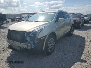 2017 Cadillac XT5 Luxury FWD with VIN 1GYKNBRS9HZ121914, listed as a Copart auction lot 56901985 with 81,017 mi miles and Salvage title. Bid and sale history available at DreamBid. Image 1.