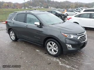 2021 Chevrolet Equinox Premier with VIN 2GNAXNEV2M6154439, listed as a IAAI auction lot 40876413 with 35,174 mi miles. Bid and sale history available at carsss.com. Image 1.