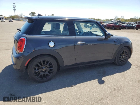 2014 MINI Hardtop S with VIN WMWXM7C54ET985344, listed as a Copart auction lot 55242945 with 87,017 mi miles and Salvage Title. Bid and sale history available at DreamBid. Image 3.
