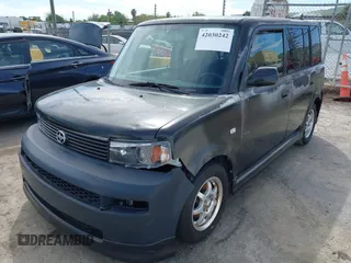 2004 Scion xB with VIN JTLKT324640138587, listed as a IAAI auction lot 42030242 with 199,289 mi miles. Bid and sale history available at carsss.com. Image 2.