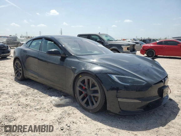 2023 Tesla Model S Plaid with VIN 5YJSA1E62PF511875, listed as a Copart auction lot 65583824 with Not provided miles and Salvage title. Bid and sale history available at DreamBid. Image 4.
