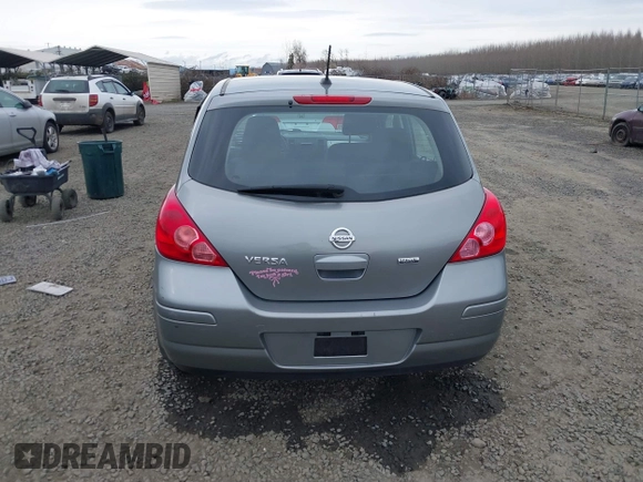 2012 Nissan Versa S with VIN 3N1BC1CP1CK807948, listed as a IAAI auction lot 41772063 with 87,126 mi miles. Bid and sale history available at carsss.com. Image 16.