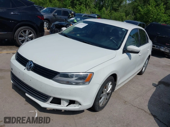 2011 Volkswagen Jetta SE z VIN 3VWDX7AJ4BM052225, wystawiony jako IAAI lot #42192222 z przebiegiem 324 889 mil mil oraz . Historia ofert i sprzedaży dostępna na DreamBid. Obrazek 2.