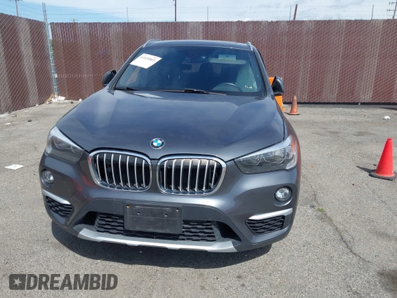 2018 BMW X1 xDrive28i with VIN WBXHT3C30J5L34702, listed as a IAAI auction lot 41935803 with 42,174 mi miles. Bid and sale history available at carsss.com. Image 12.