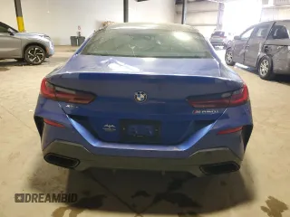 2024 BMW 8 Series M850i z VIN WBAGV8C07RCP90030, wystawiony jako Copart lot #53668245 z przebiegiem Nie podano mil oraz Szkody całkowita. Historia ofert i sprzedaży dostępna na DreamBid. Obrazek 6.