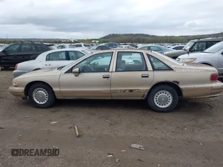 1994 Chevrolet Caprice Classic 1SA Special Value Pkg with VIN 1G1BL52W2RR201821, listed as a IAAI auction lot 41884064 with 186,192 mi miles. Bid and sale history available at carsss.com. Image 14.