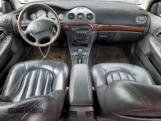 2000 Chrysler 300M M z VIN 2C3HE66G0YH382022, wystawiony jako Copart lot #74367174 z przebiegiem 145 677 mil mil oraz Czysty tytuł • Clean title. Historia ofert i sprzedaży dostępna na DreamBid. Obrazek 8.