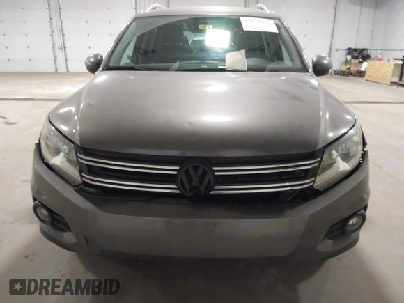 2012 Volkswagen Tiguan S with VIN WVGBV7AX2CW002991, listed as a IAAI auction lot 42031877 with 205,979 mi miles and . Bid and sale history available at DreamBid. Image 12.