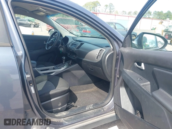 2015 Kia Sportage LX with VIN KNDPB3AC9F7757711, listed as a IAAI auction lot 41759749 with 179,111 mi miles and . Bid and sale history available at DreamBid. Image 5.