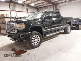 2015 GMC Sierra 2500HD available WiFi Denali with VIN 1GT120E89FF117773, listed as a IAAI auction lot 41587823 with 251,371 mi miles. Bid and sale history available at carsss.com. Image 2.
