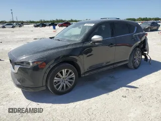 2024 Mazda CX-5 2.5 Turbo Signature with VIN JM3KFBXY2R0354346, listed as a Copart auction lot 49260525 with 9,571 mi miles and Salvage Title. Bid and sale history available at carsss.com. Image 1.