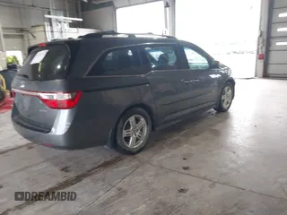 2011 Honda Odyssey Touring с VIN 5FNRL5H90BB025855, выставлен на аукционе IAAI как лот 42104979 с пробегом 165 010 миль миль и . История ставок и продаж доступна на DreamBid. Изображение 4.