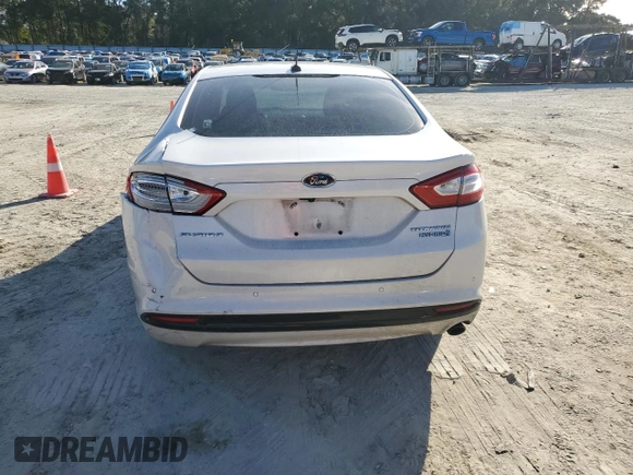 2013 Ford Fusion Titanium Hybrid with VIN 3FA6P0RU2DR277773, listed as a Copart auction lot 85990424 with 215,289 mi miles and Non Repairable. Bid and sale history available at DreamBid. Image 6.