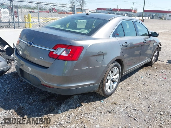 2011 Ford Taurus SEL with VIN 1FAHP2EW5BG189882, listed as a IAAI auction lot 42006542 with 208,661 mi miles. Bid and sale history available at carsss.com. Image 4.