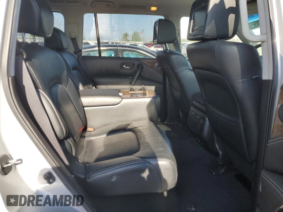 2015 Infiniti QX80 z VIN JN8AZ2NE5F9080124, wystawiony jako Copart lot #55226415 z przebiegiem Nie podano mil oraz Czysty tytuł • Clean title. Historia ofert i sprzedaży dostępna na DreamBid. Obrazek 11.