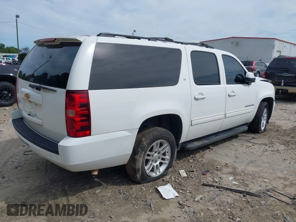 2014 Chevrolet Suburban LT with VIN 1GNSCJE08ER185472, listed as a IAAI auction lot 39849223 with 198,853 mi miles. Bid and sale history available at carsss.com. Image 4.