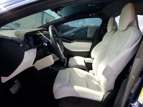 2017 Tesla Model X P100D with VIN 5YJXCBE4XHF051760, listed as a Copart auction lot 63593384 with NaN miles and Salvage Title. Bid and sale history available at carsss.com. Image 7.