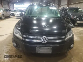 2012 Volkswagen Tiguan SE z VIN WVGAV7AX5CW536238, wystawiony jako Copart lot #55528005 z przebiegiem 127 732 mil mil oraz Szkody całkowita. Historia ofert i sprzedaży dostępna na DreamBid. Obrazek 5.
