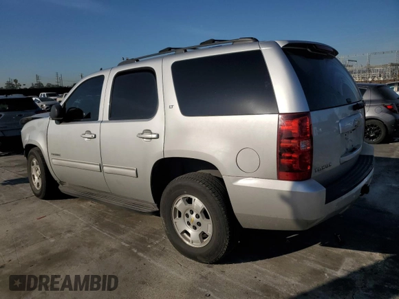 2014 Chevrolet Tahoe LT with VIN 1GNSCBE07ER188160, listed as a Copart auction lot 49626175 with 96,168 mi miles and Salvage title. Bid and sale history available at DreamBid. Image 2.