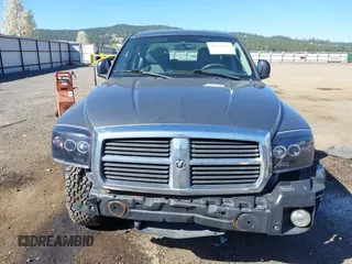 2005 Dodge Dakota SLT with VIN 1D7HW48N25S133725, listed as a IAAI auction lot 42074588 with 163,090 mi miles. Bid and sale history available at carsss.com. Image 12.