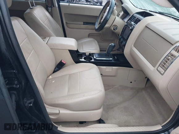 2010 Ford Escape Limited z VIN 1FMCU0EG0AKC63470, wystawiony jako IAAI lot #41198945 z przebiegiem 198 301 mil mil oraz . Historia ofert i sprzedaży dostępna na DreamBid. Obrazek 5.