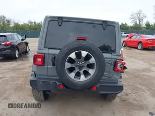 2022 Jeep Wrangler Unlimited Sahara with VIN 1C4HJXEG7NW138105, listed as a IAAI auction lot 42146898 with Not provided miles and . Bid and sale history available at DreamBid. Image 17.