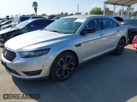 2014 Ford Taurus SHO with VIN 1FAHP2KT8EG123342, listed as a IAAI auction lot 42095390 with 142,957 mi miles. Bid and sale history available at carsss.com. Image 17.