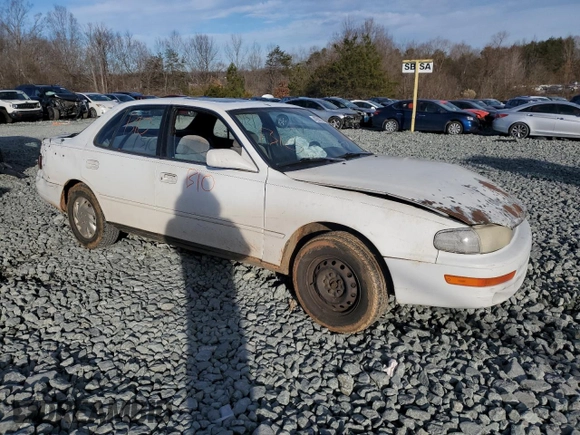 1994 Toyota Camry LE with VIN 4T1SK12E4RU396095, listed as a Copart auction lot 42987105 with 289,218 mi miles and Salvage Title. Bid and sale history available at carsss.com. Image 4.