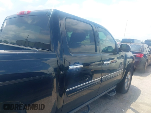 2011 Chevrolet Silverado 1500 LT with VIN 3GCPCSE06BG391860, listed as a IAAI auction lot 42077801 with 214,709 mi miles and . Bid and sale history available at DreamBid. Image 13.