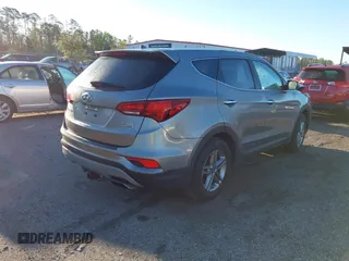 2018 Hyundai Santa Fe 2.4L z VIN 5NMZTDLB8JH098926, wystawiony jako IAAI lot #41816513 z przebiegiem 92 920 mil mil oraz . Historia ofert i sprzedaży dostępna na DreamBid. Obrazek 4.