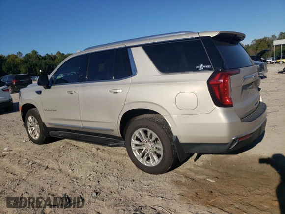 2021 GMC Yukon SLT with VIN 1GKS1BKDXMR435793, listed as a Copart auction lot 76443834 with 71,027 mi miles and Salvage Title. Bid and sale history available at carsss.com. Image 2.