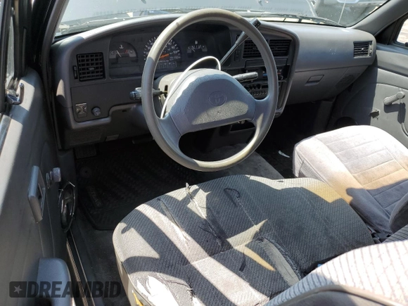 1994 Toyota Pickup z VIN JT4VN93D7R5043017, wystawiony jako Copart lot #55316015 z przebiegiem 149 112 mil mil oraz Szkoda całkowita • Salvage title. Historia ofert i sprzedaży dostępna na DreamBid. Obrazek 8.