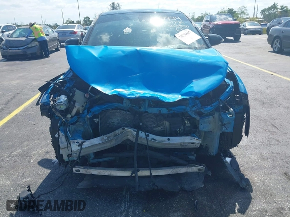 2019 Toyota C-HR XLE with VIN NMTKHMBX6KR097934, listed as a IAAI auction lot 39276687 with 56,973 mi miles. Bid and sale history available at carsss.com. Image 6.
