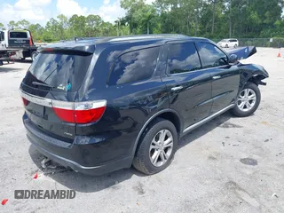 2013 Dodge Durango Crew with VIN 1C4RDHDG9DC684746, listed as a IAAI auction lot 42473302 with 122,602 mi miles and . Bid and sale history available at DreamBid. Image 4.
