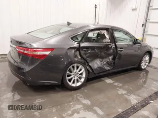 2014 Toyota Avalon Limited with VIN 4T1BK1EBXEU114134, listed as a IAAI auction lot 41727586 with 117,592 mi miles and . Bid and sale history available at DreamBid. Image 4.